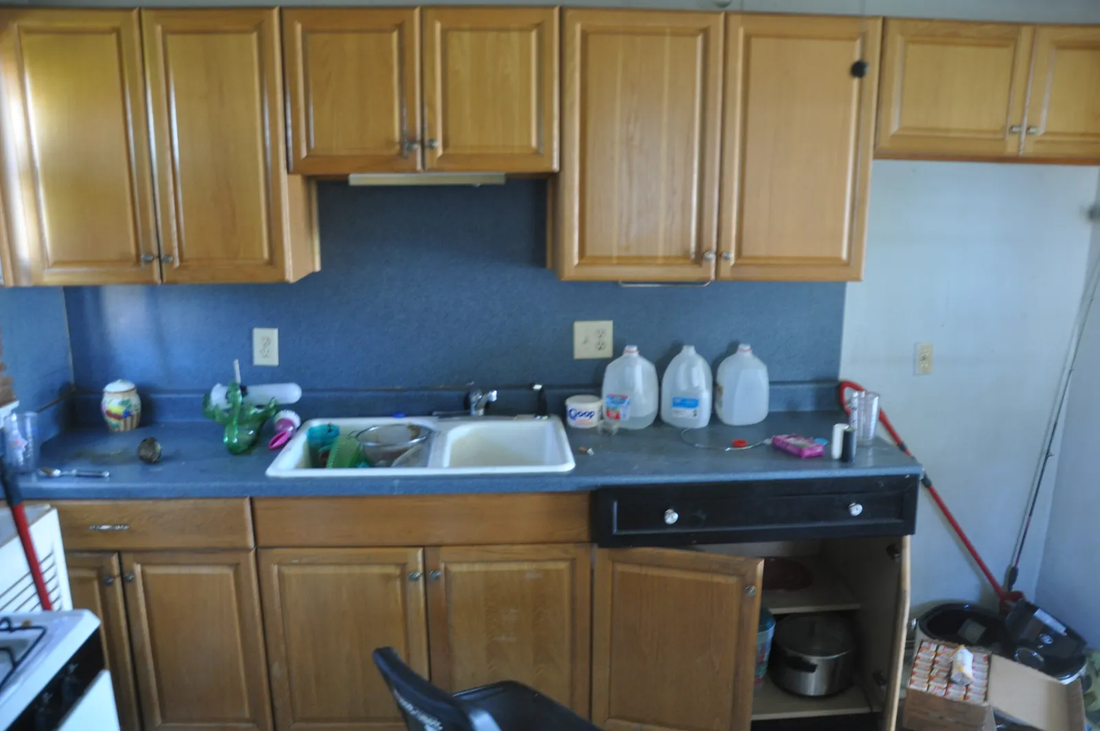 Kitchen run along the window wall — before renovation