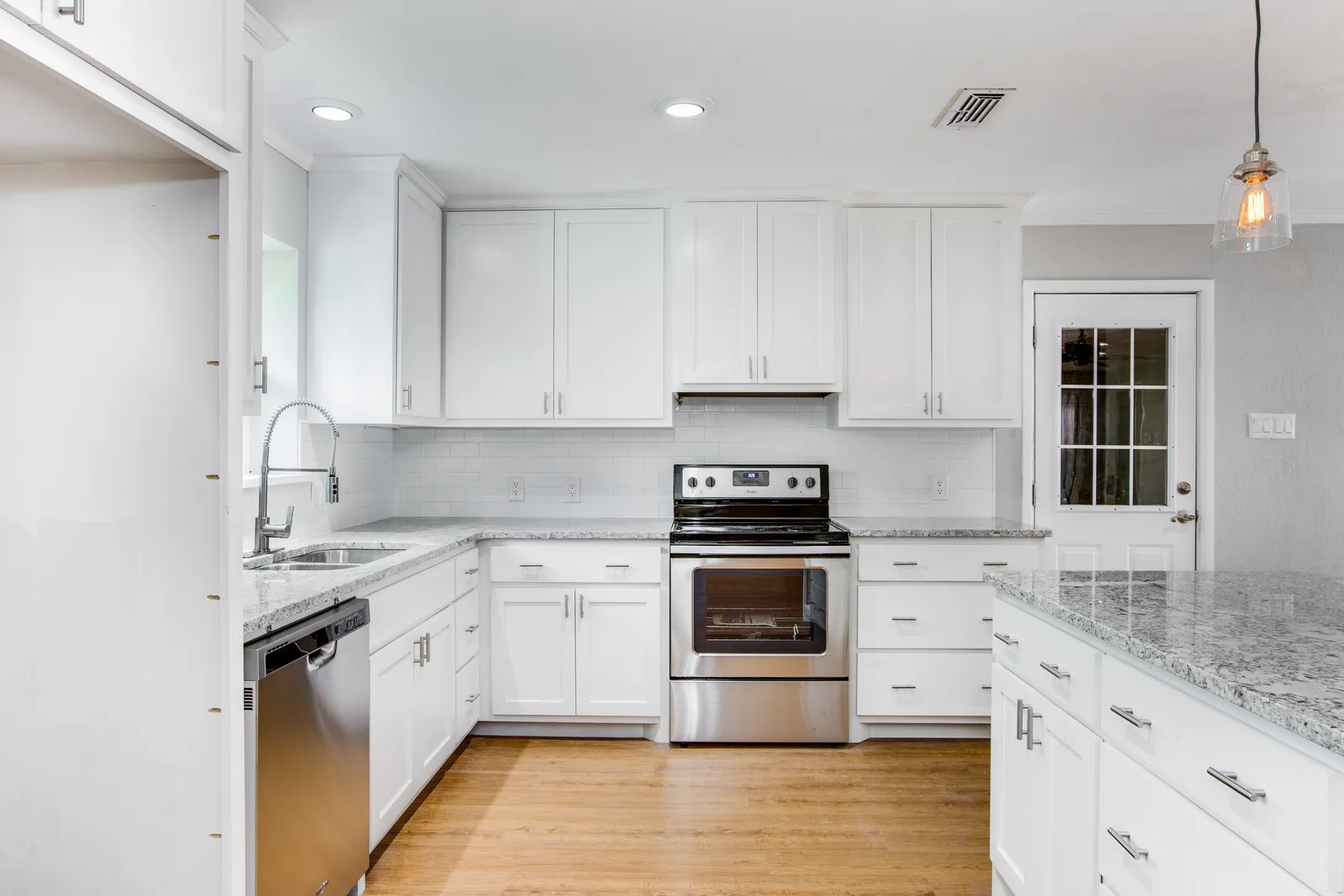 Kitchen corner with window over the sink — after renovation