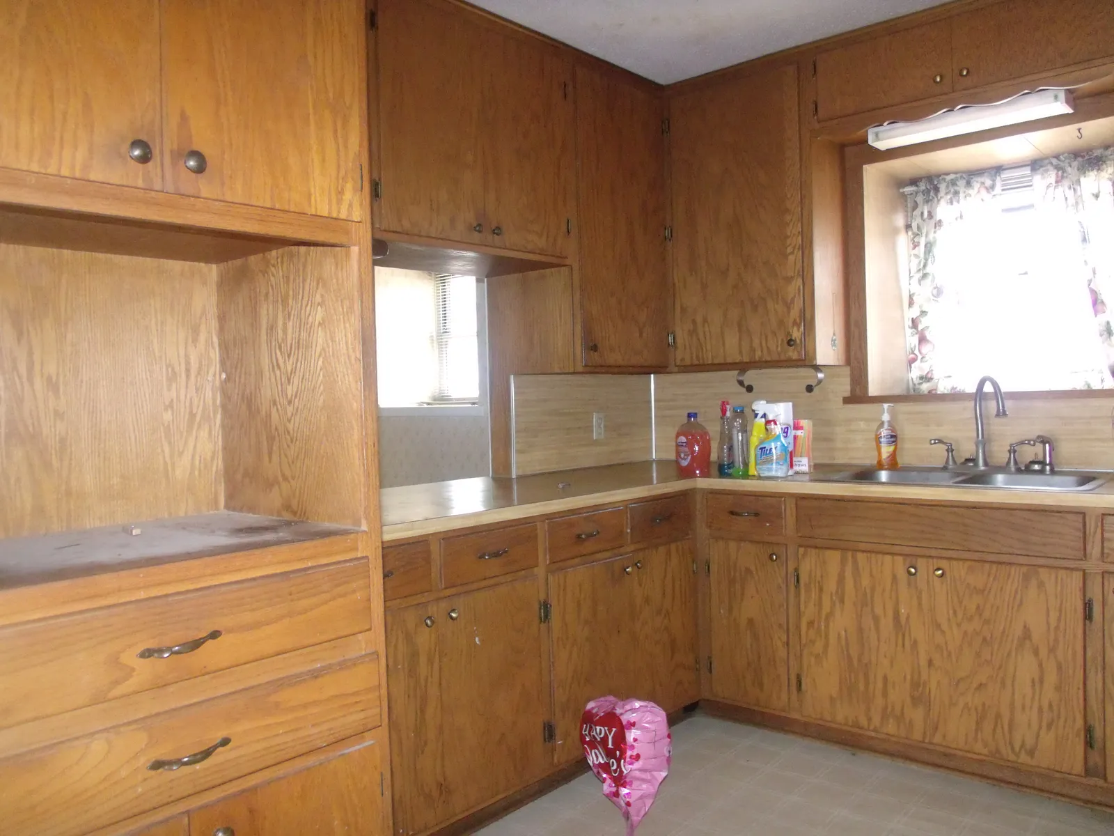 Kitchen corner with window over the sink — before renovation